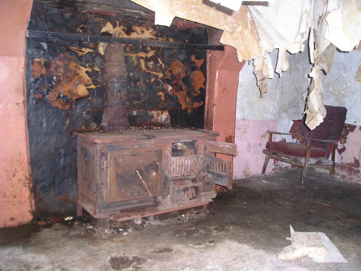 Rusting stove in abandoned house, Glenshesk