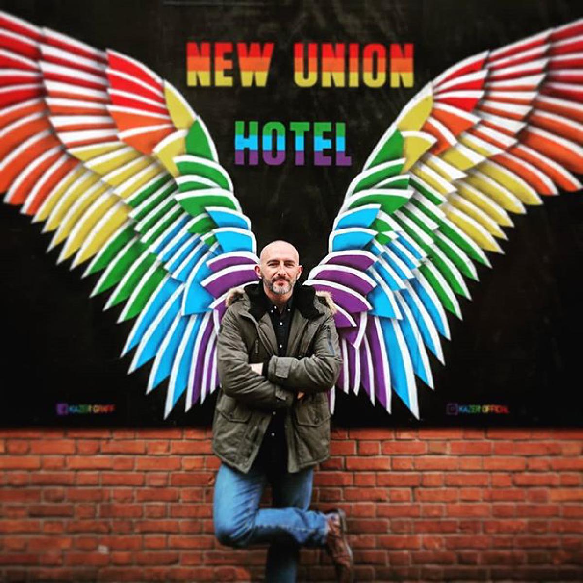 Portrait with rainbow wings, Manchester